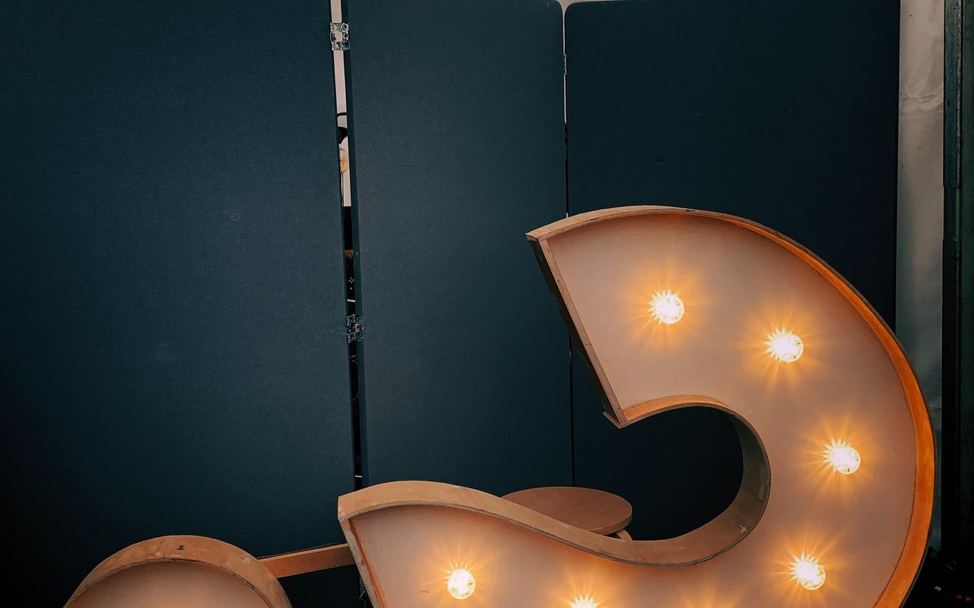 white markee light by Jon Tyson courtesy of Unsplash.