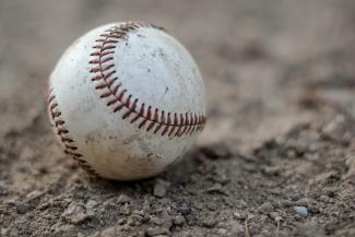 softball on land by Thomas Park courtesy of Unsplash.