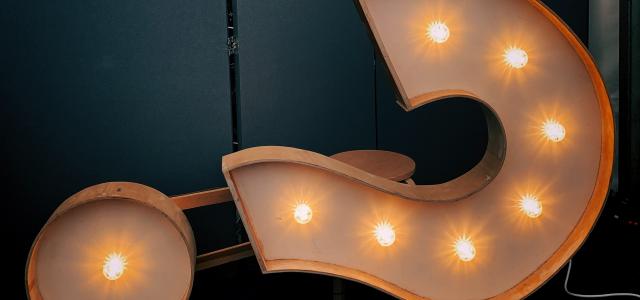 white markee light by Jon Tyson courtesy of Unsplash.